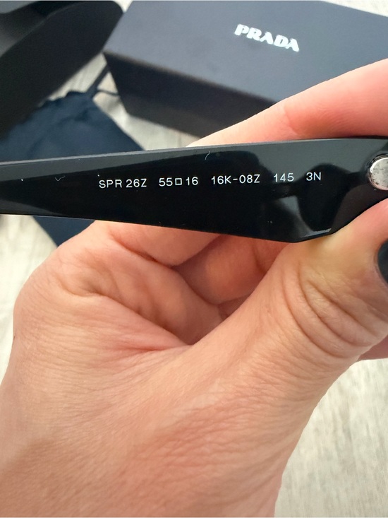 Prada Symbole Black Oval Sunglasses